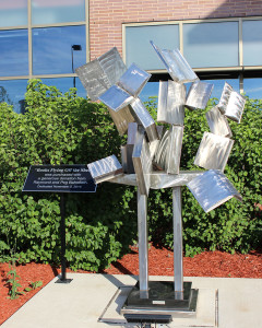 Books Flying Off the Shelf sculpture