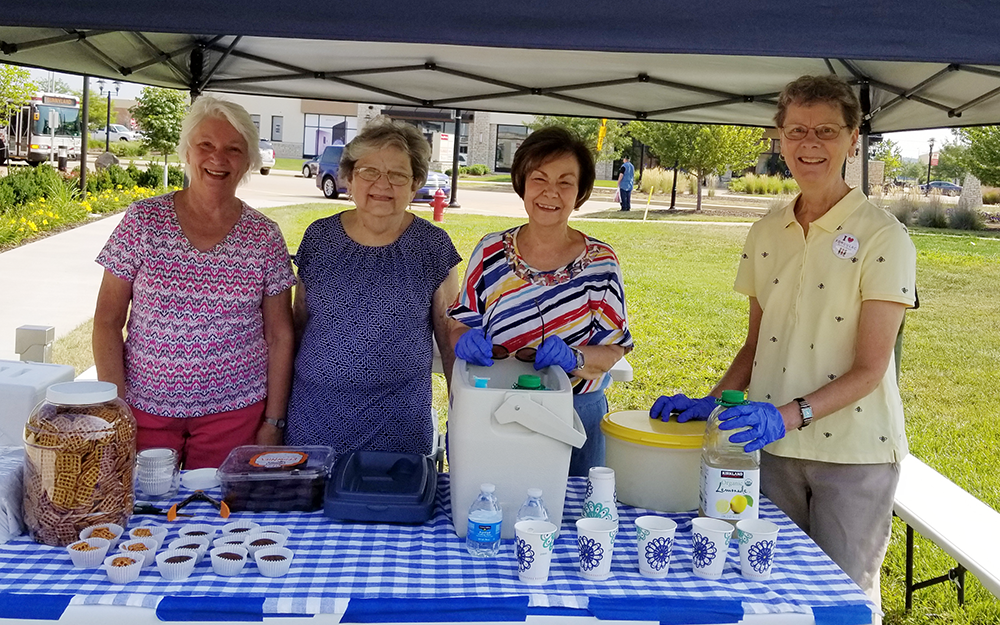 Group of four women during smiling during a Friends event