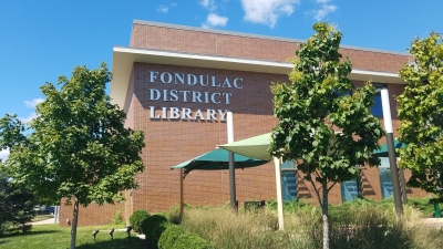 View of brick library building with Fondulac District Library lettering