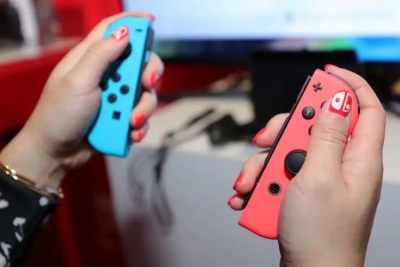 hands holding video game controller