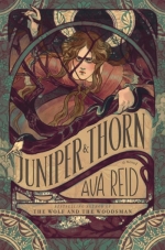 Juniper and Thorn book cover - a long haired witch looks through thorns