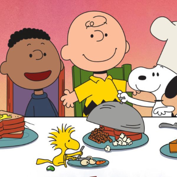 Peanuts comic characters having a meal