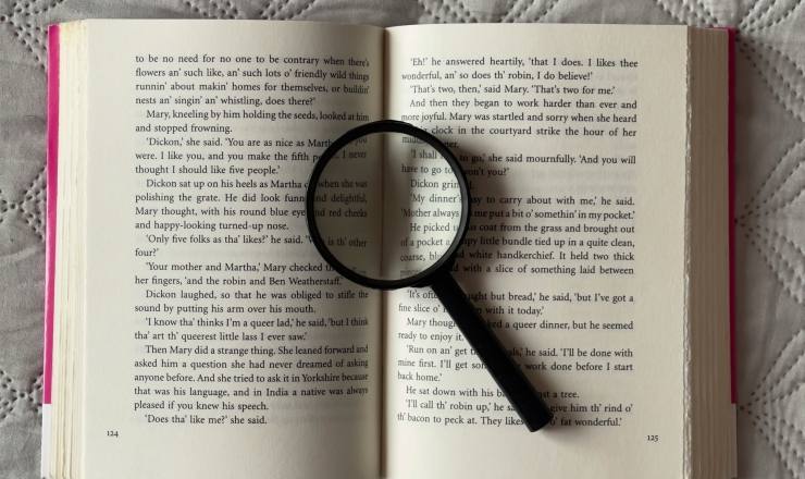 Interlibrary loan - Open book with magnifying glass